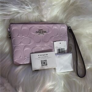 Coach Corner Zip Signature Wristlet with Heart Charm